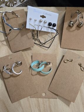 Fashion Jewelry. Various Styles Of Metal Earrings.